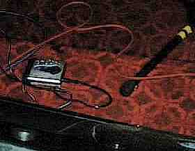 a MiniDisc player on the stage floor; a common sight these days